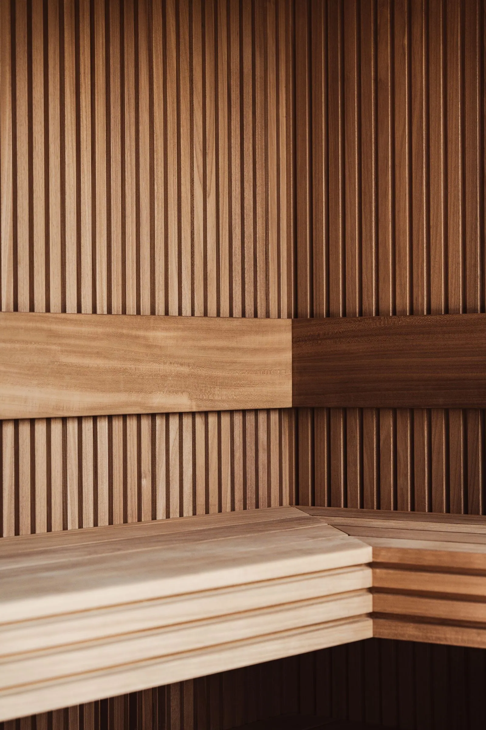 Wooden sauna interior with benches, no people